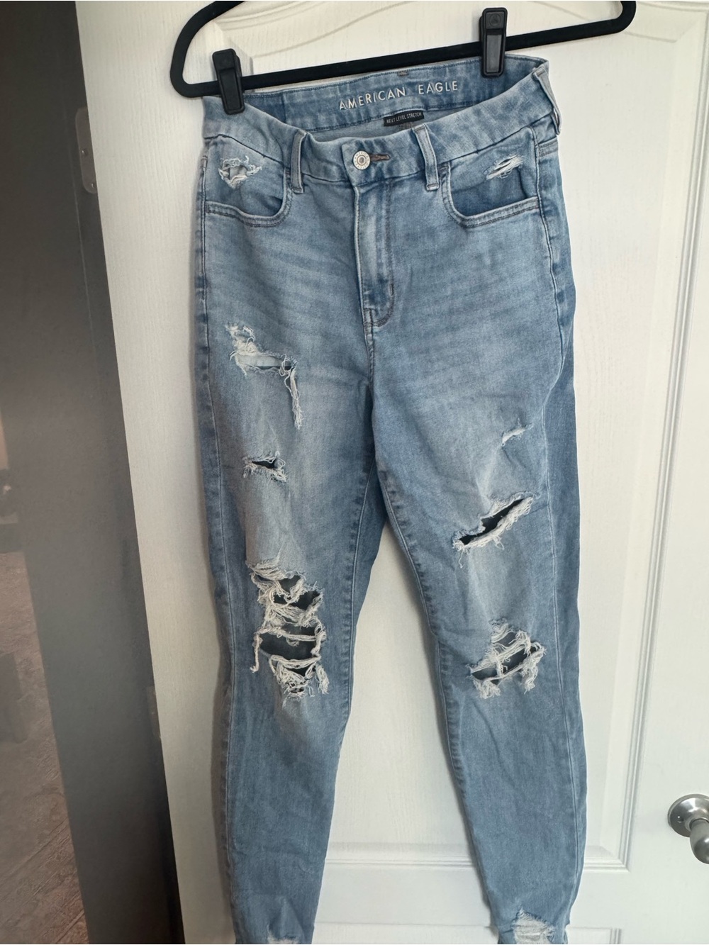 American Eagle Outfitters Light Wash Ripped curvy hi-rise jegging Jeans